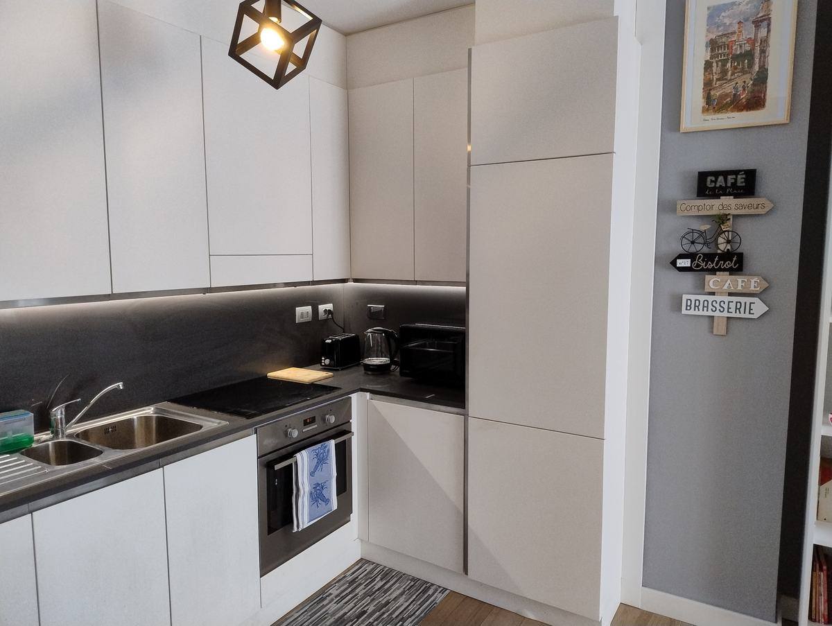 Fully equipped white kitchen